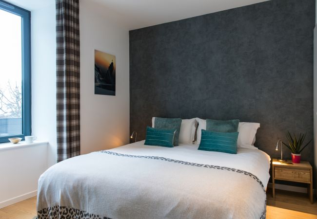 Chambre 1,  flexible avec un lit double ou deux lits simples  Chambre 1 de Chamois 2 est flexible avec un lit double ou deux lits simples