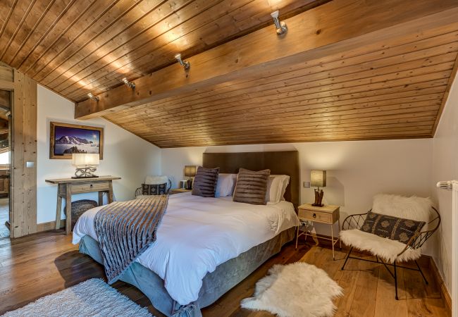 Bedroom 1, double room with ensuite and shared balcony Bedroom 1 of Chalet Sanaz is a double room with an ensuite and shared balcony