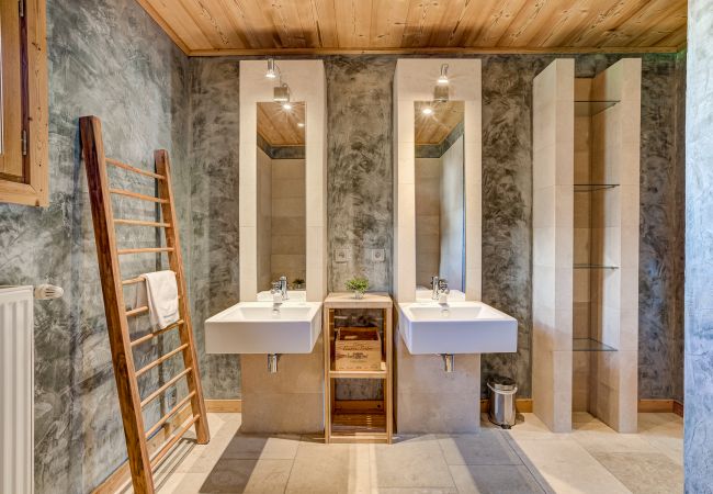 Spacious with twin basins  Chalet Sanaz has a spacious bathroom with twin basins