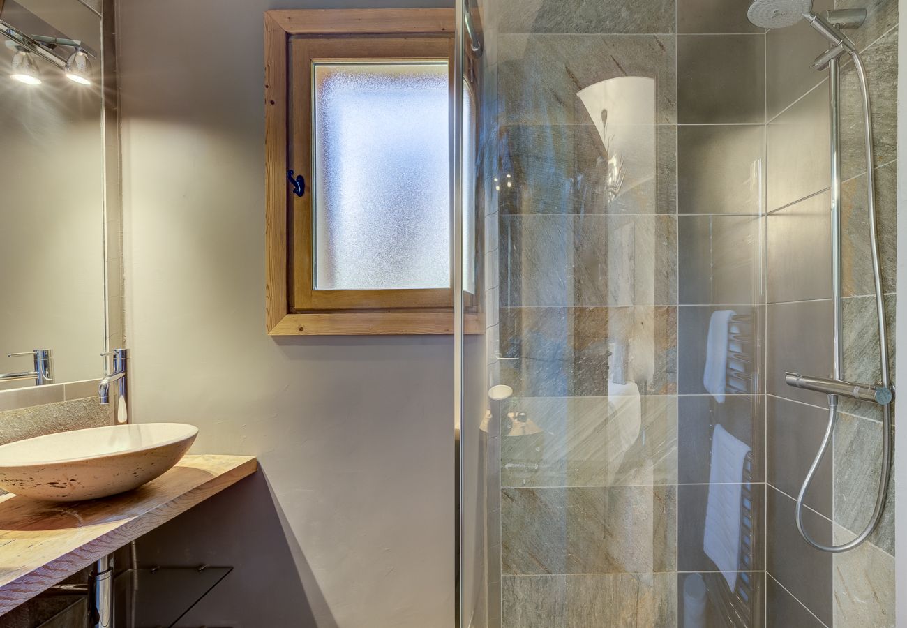 Ensuite to Bedroom 2 with shower and basin The ensuite to Bedroom 2 of Chalet Sanaz has a shower and basin