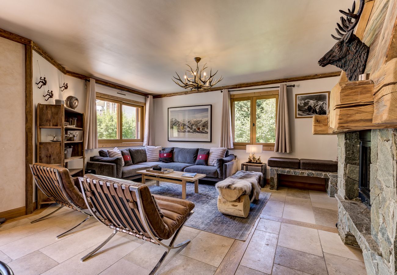 Comfortable lounge area around log burner Chalet Sanaz has a comfortable lounge area around a log burner