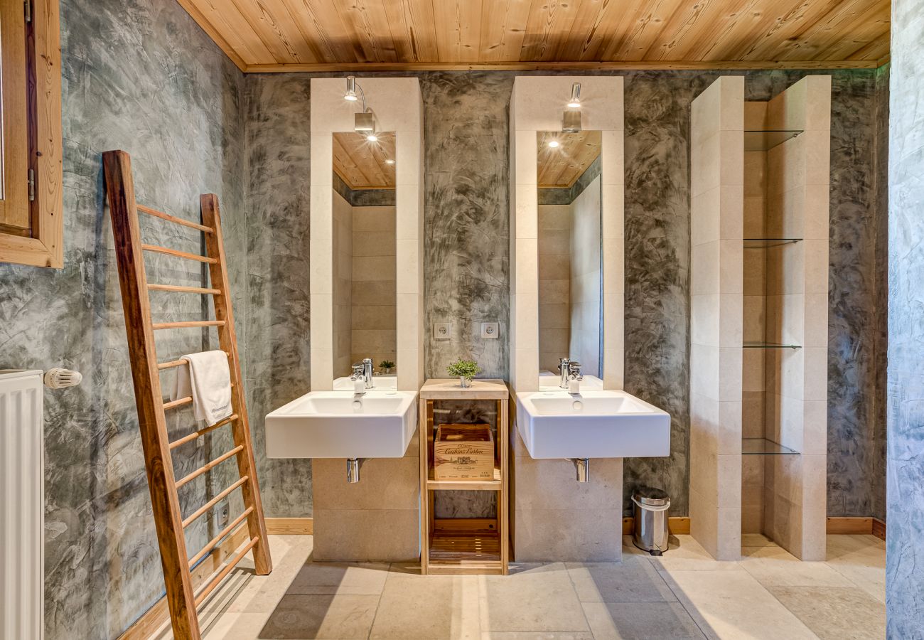 Spacious with twin basins  Chalet Sanaz has a spacious bathroom with twin basins