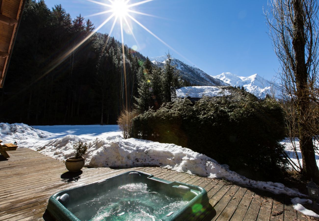 Hot tub with mountain views Chalet Sanaz has a hot tub with mountain views