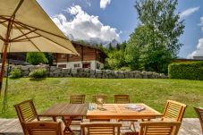 Chalet Caleris has a large deck with a BBQ for outdoor dining