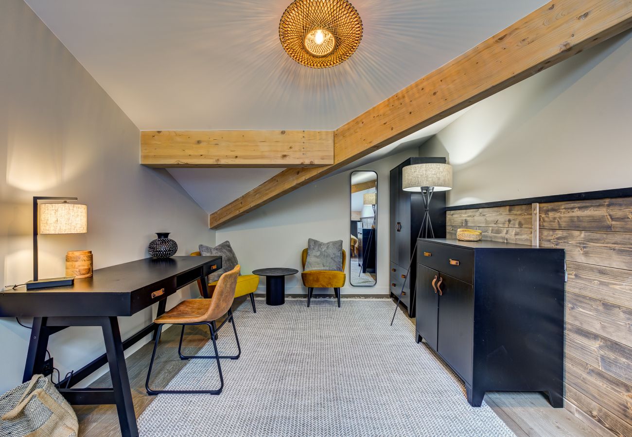 Bedroom 3, spacious with a desk and cosy seating area  Bedroom 3 of White Pearl A36 is spacious with a desk and cosy seating area