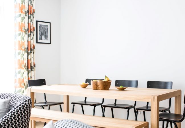 Large dining table comfortably seating 7 people Chamois 1 has a large dining table.