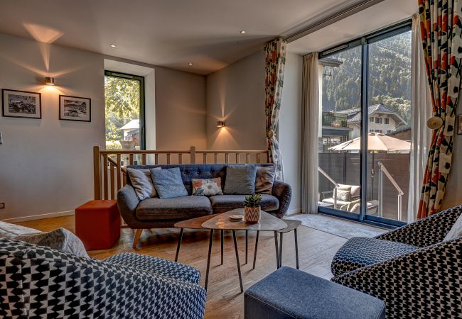 Glass doors open to steps down to terrace Glass doors in Chamois 1 open to steps down to the terrace.