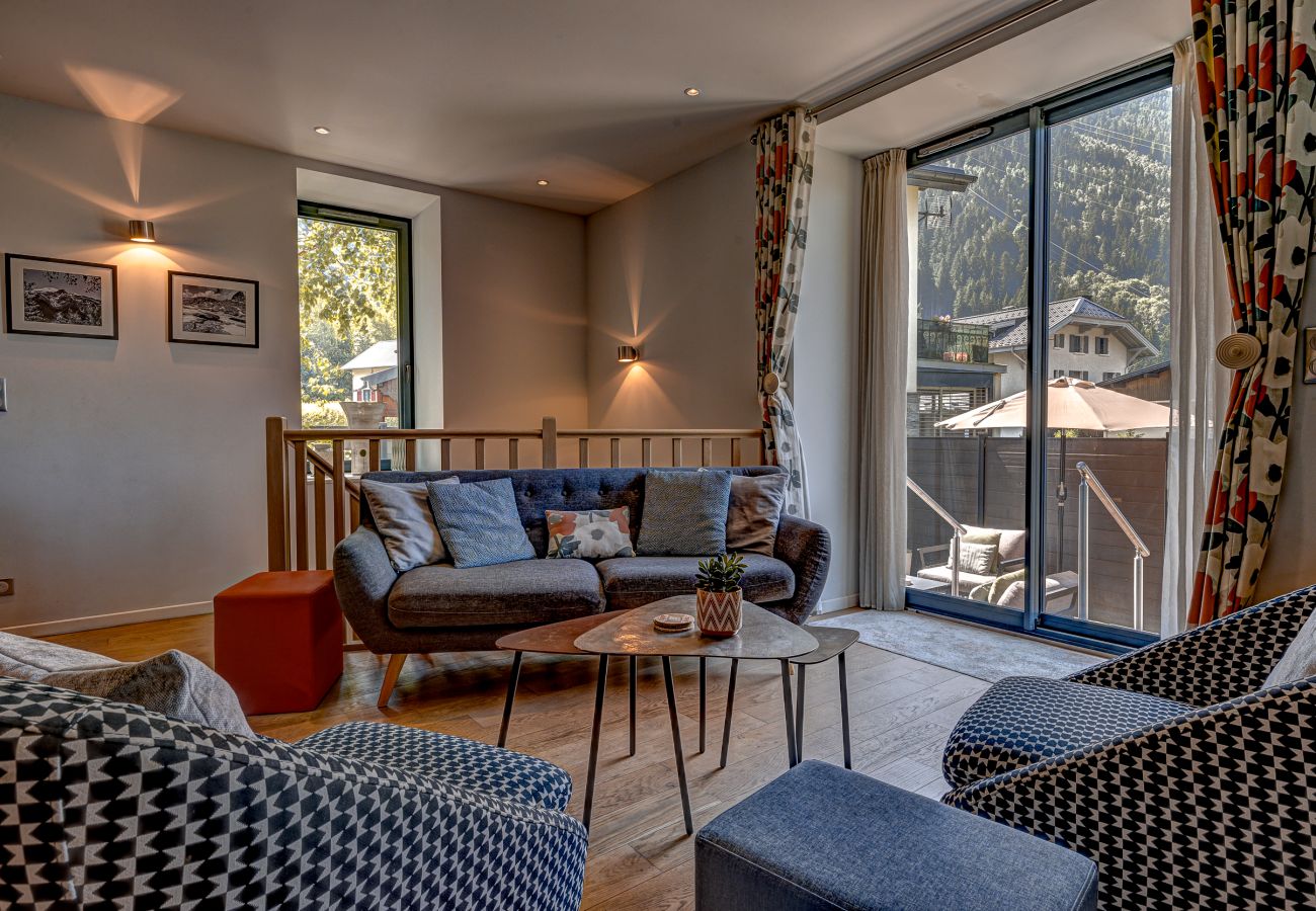 Glass doors open to steps down to terrace Glass doors in Chamois 1 open to steps down to the terrace.