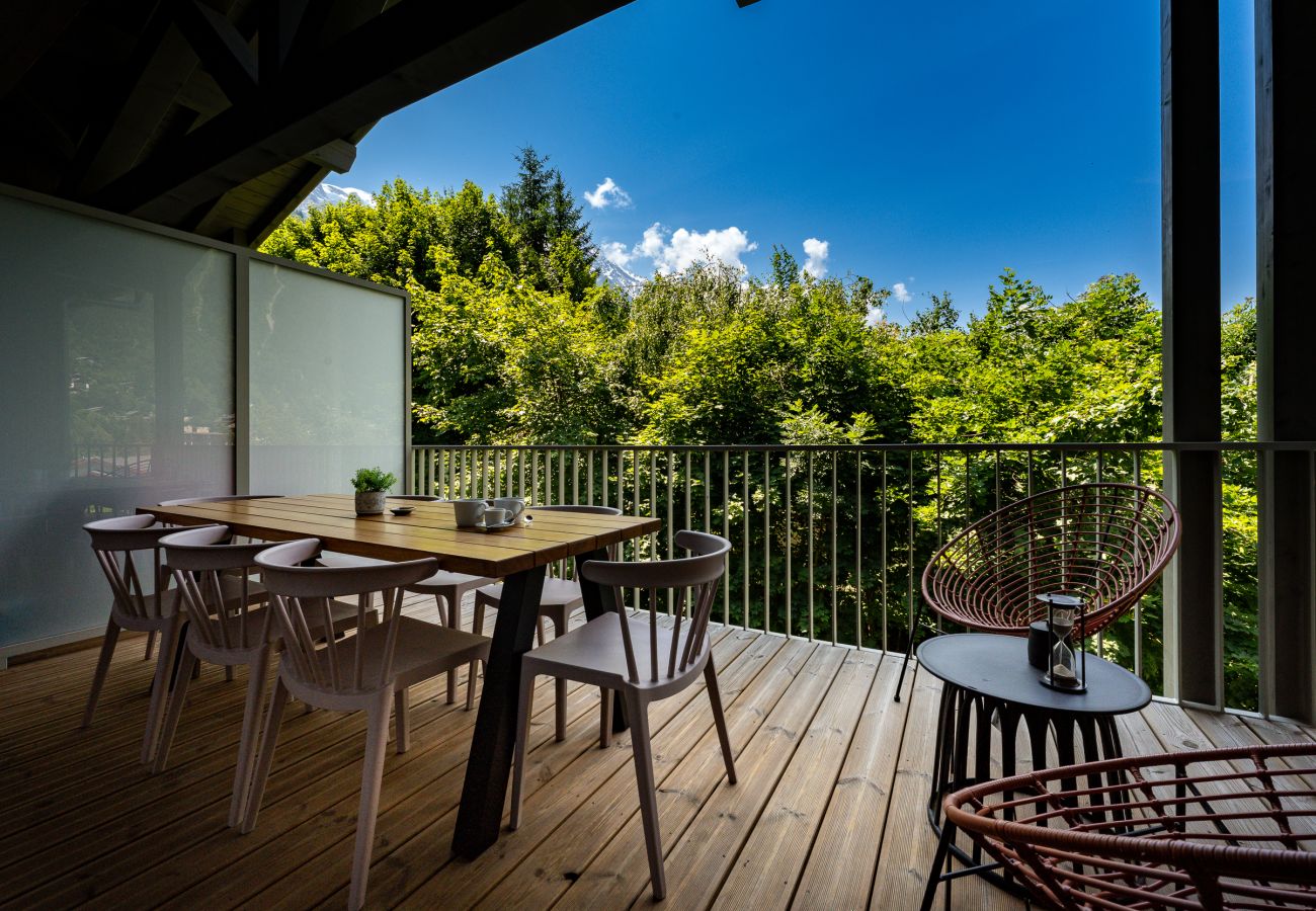 Outdoor furniture This apartment has outdoor furniture for dining and relaxing